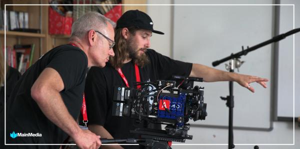 Two camera men using an ARRI camera, conducting video production services for a client, for a TV ad
